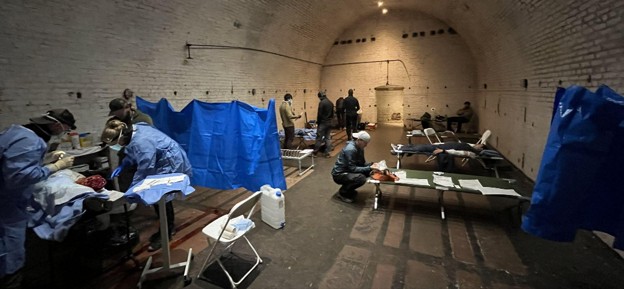 A Mix of NATO Special Operations Combat Medics and clinicians perform surgery on a simulated patient deep underground during the NATO SOFCOM University College Cork Advanced Medical Concepts Course  Credit Paul Loos
